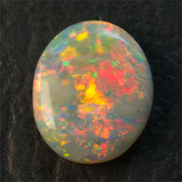 Very Brilliant Red Dominant Semi-black Opal