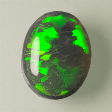 Grande opale noire verte et rouge très brillante rolling flash