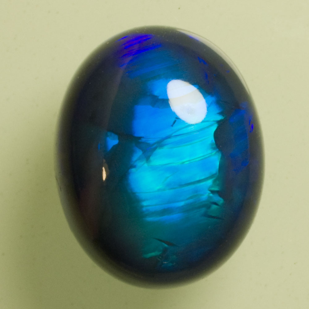 3545REV Opale Noire Rolling Flash Bleu Et Vert 6 77ct 13 6x10 9mm 4